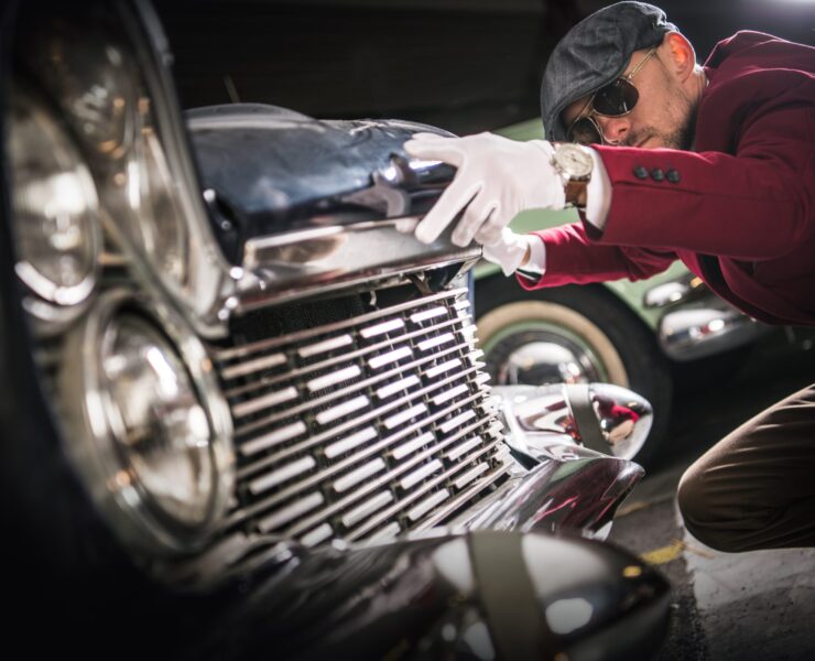 Car Collector Evaluation Classic Car Collector Evaluation. Caucasian Men Taking Close Look on the Vintage American Vehicle For Sale.